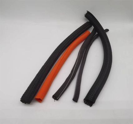 สีดํา PET สับผ่า Self-Wrapping sleeving ความยืดหยุ่นสูง